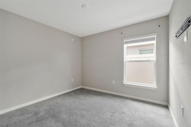 1159 Mountain Flower Ln, Davenport, FL 33837 - carpeted spare room featuring baseboards
