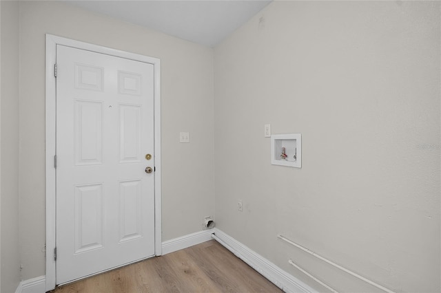 1011 W 13th St, Lakeland, FL 33805 - laundry room featuring light wood-type flooring and washer hookup