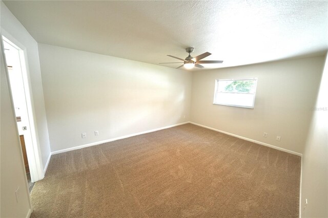 5472 E Grant St, Orlando, FL 32812 - carpeted empty room with a ceiling fan and baseboards