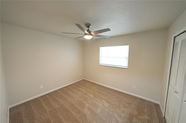 5472 E Grant St, Orlando, FL 32812 - unfurnished bedroom featuring a closet, light colored carpet, and ceiling fan