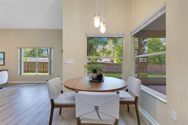 2024 Flaming Arrow Ct, Fern Park, FL 32730 - dining room with wood finished floors and a high ceiling