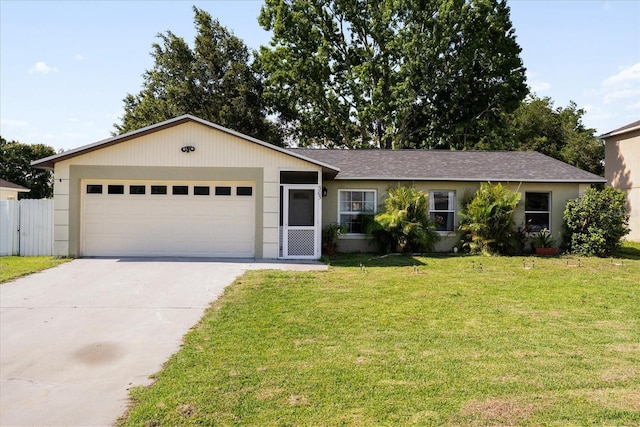 303 Mariana Way, Kissimmee, FL 34758 - ranch-style home with a garage, concrete driveway, and a shingled roof