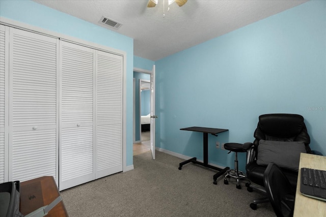 303 Mariana Way, Kissimmee, FL 34758 - office featuring carpet floors, a ceiling fan, and a textured ceiling