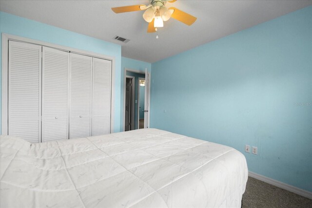 303 Mariana Way, Kissimmee, FL 34758 - bedroom with a closet, carpet, and a ceiling fan