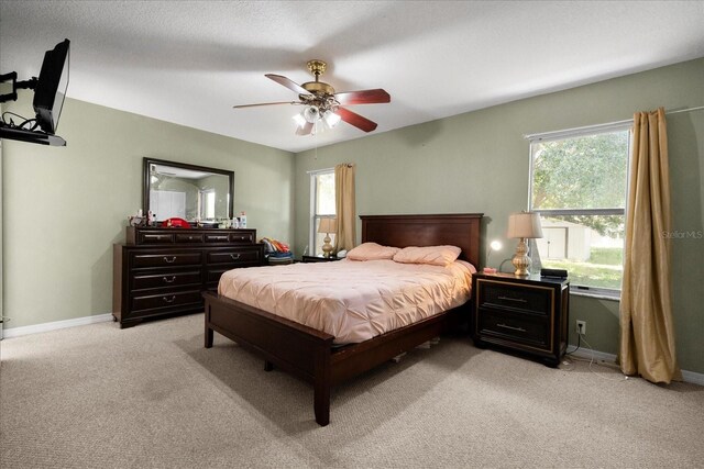 303 Mariana Way, Kissimmee, FL 34758 - bedroom featuring light carpet and ceiling fan