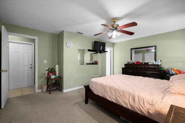303 Mariana Way, Kissimmee, FL 34758 - carpeted bedroom with baseboards and ceiling fan