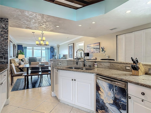 2055 S Atlantic Ave Unit 1410, Daytona Beach Shores, FL 32118 - kitchen featuring stainless steel dishwasher, light tile patterned floors, open floor plan, ornamental molding, and recessed lighting