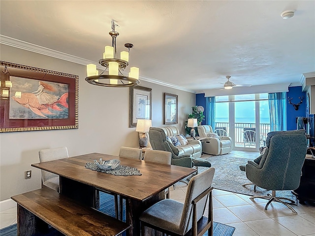 2055 S Atlantic Ave Unit 1410, Daytona Beach Shores, FL 32118 - dining area featuring light tile patterned floors, ornamental molding, ceiling fan, and a chandelier