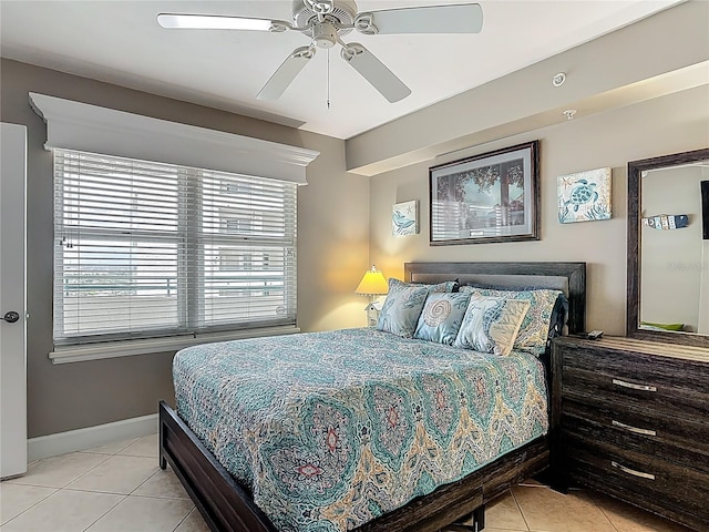 2055 S Atlantic Ave Unit 1410, Daytona Beach Shores, FL 32118 - bedroom with light tile patterned floors and ceiling fan