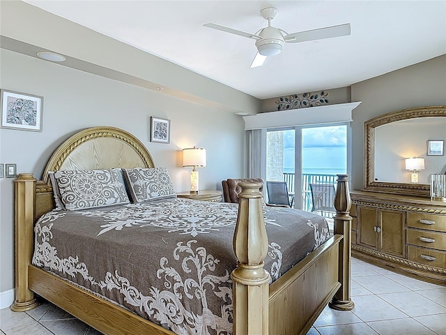 2055 S Atlantic Ave Unit 1410, Daytona Beach Shores, FL 32118 - bedroom with access to exterior, light tile patterned floors, and a ceiling fan
