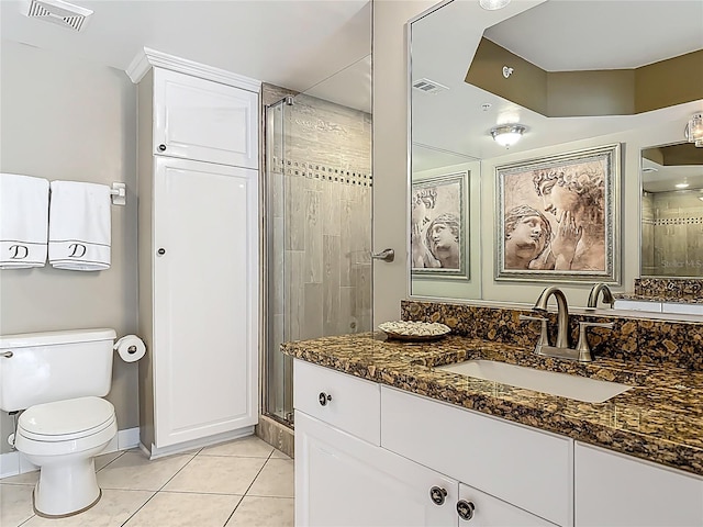 2055 S Atlantic Ave Unit 1410, Daytona Beach Shores, FL 32118 - bathroom with vanity, a stall shower, and tile patterned flooring