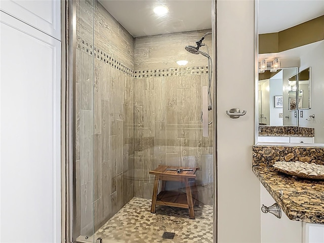 2055 S Atlantic Ave Unit 1410, Daytona Beach Shores, FL 32118 - bathroom with a shower stall and vanity