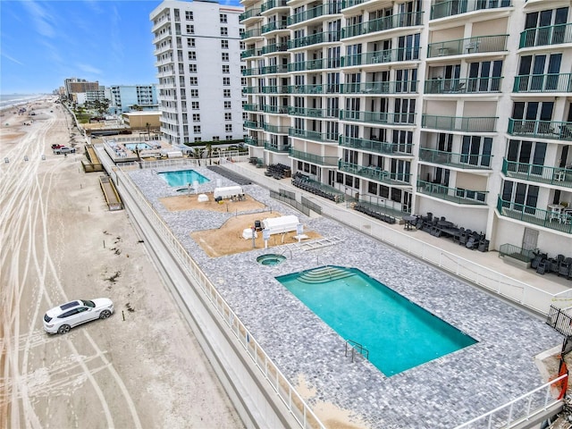2055 S Atlantic Ave Unit 1410, Daytona Beach Shores, FL 32118 - view of swimming pool featuring a city view