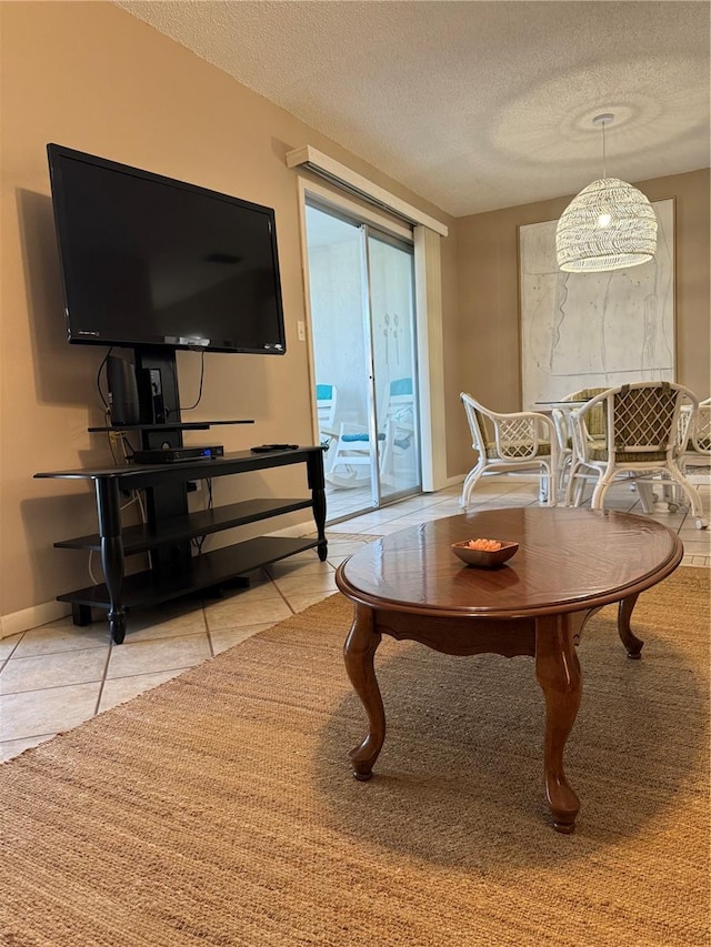 2400 Forest Dr Unit 219, Inverness, FL 34453 - living room featuring tile patterned floors and a textured ceiling