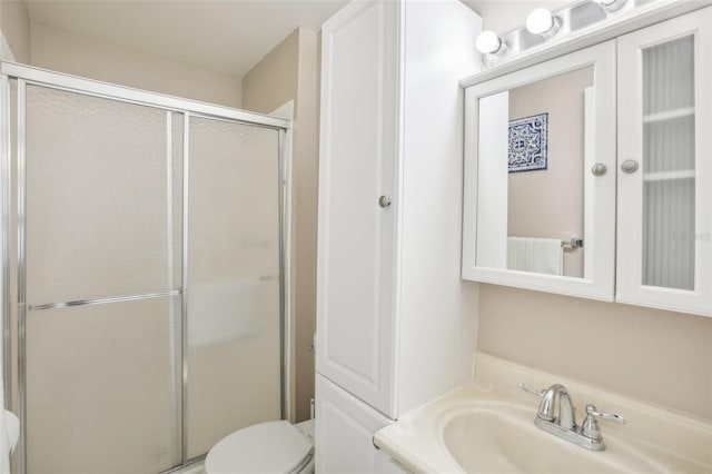 2400 Forest Dr Unit 219, Inverness, FL 34453 - bathroom featuring a shower stall and vanity