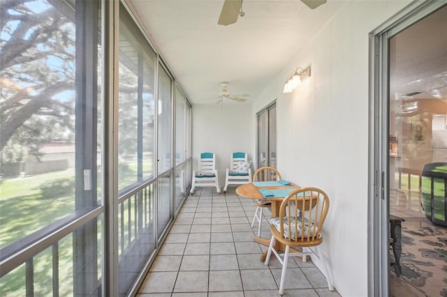 2400 Forest Dr Unit 219, Inverness, FL 34453 - sunroom with a ceiling fan and tile patterned floors