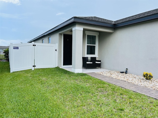 2824 Neverland Dr, New Smyrna Beach, FL 32168 - entrance to property featuring stucco siding