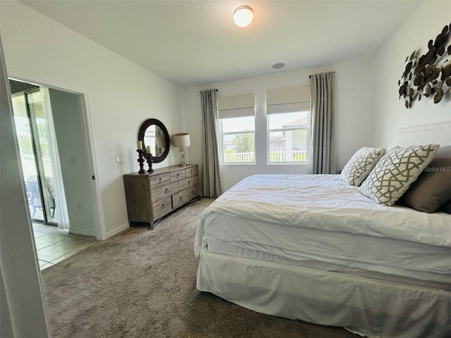 2824 Neverland Dr, New Smyrna Beach, FL 32168 - bedroom with light colored carpet and baseboards