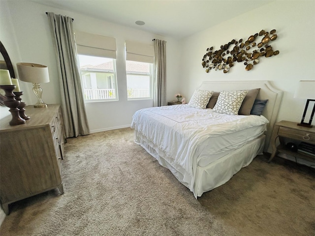 2824 Neverland Dr, New Smyrna Beach, FL 32168 - bedroom with light carpet and baseboards