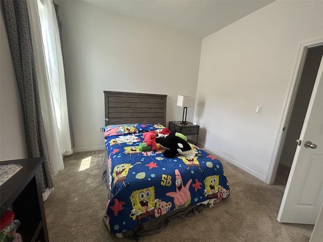 2824 Neverland Dr, New Smyrna Beach, FL 32168 - bedroom with carpet flooring and baseboards