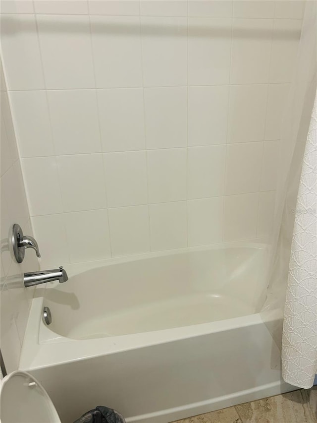 2824 Neverland Dr, New Smyrna Beach, FL 32168 - full bath featuring shower / bathtub combination with curtain