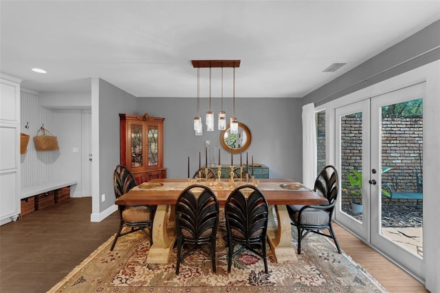 4702 Shorecrest Dr, Orlando, FL 32817 - dining room with french doors and wood finished floors