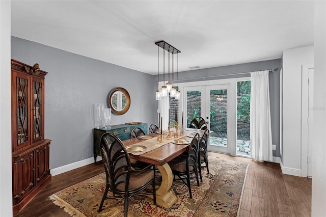 4702 Shorecrest Dr, Orlando, FL 32817 - dining space featuring french doors and wood finished floors