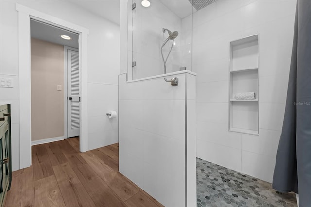 4702 Shorecrest Dr, Orlando, FL 32817 - full bathroom with walk in shower, wood finished floors, and recessed lighting