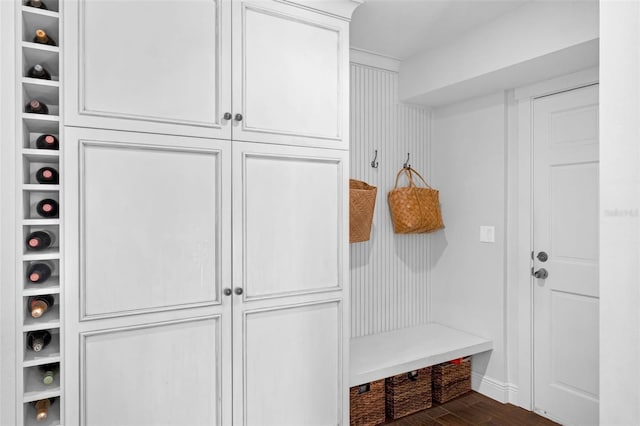 4702 Shorecrest Dr, Orlando, FL 32817 - mudroom with dark wood-type flooring and baseboards