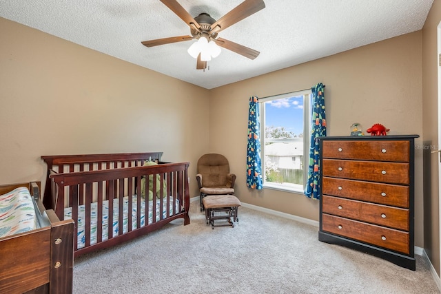 100 Monterey Oaks Dr, Sanford, FL 32771 - carpeted bedroom featuring a ceiling fan, a crib, and a textured ceiling