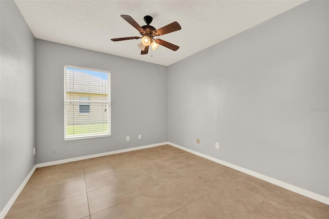 2713 Eagle Glen Cir, Kissimmee, FL 34746 - empty room featuring light tile patterned floors, ceiling fan, and a textured ceiling