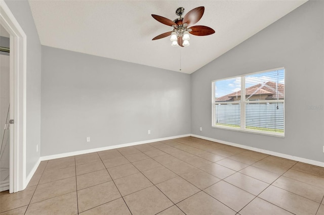 2713 Eagle Glen Cir, Kissimmee, FL 34746 - unfurnished room featuring vaulted ceiling, light tile patterned floors, and a ceiling fan