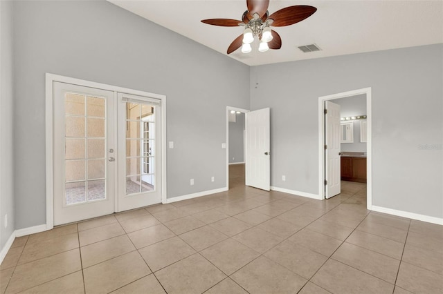 2713 Eagle Glen Cir, Kissimmee, FL 34746 - unfurnished bedroom with french doors, light tile patterned flooring, access to outside, high vaulted ceiling, and a ceiling fan