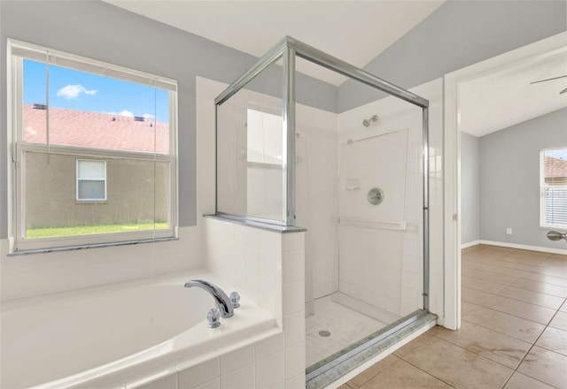 2713 Eagle Glen Cir, Kissimmee, FL 34746 - bathroom with a shower stall, a bath, and tile patterned flooring