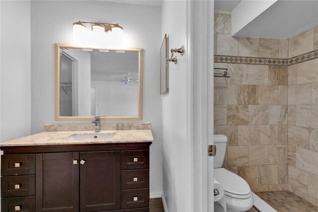 845 Valnera Ct, Kissimmee, FL 34758 - full bathroom with vanity, ceiling fan, and a tile shower