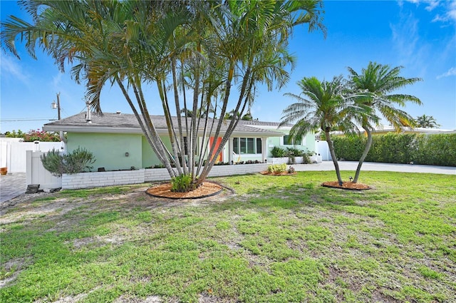 231 Ocean Blvd, Satellite Beach, FL 32937 - view of front facade with stucco siding