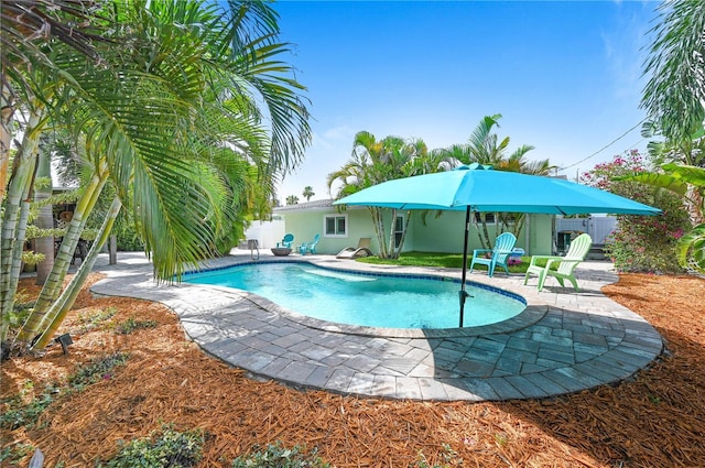 231 Ocean Blvd, Satellite Beach, FL 32937 - outdoor pool with a patio area