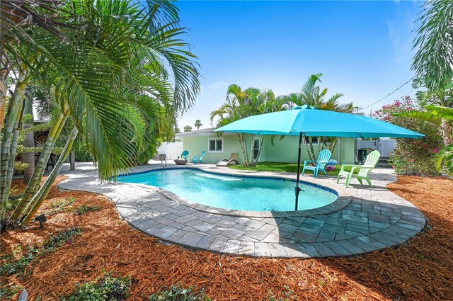 231 Ocean Blvd, Satellite Beach, FL 32937 - swimming pool with a patio