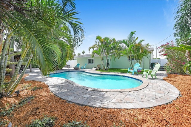 231 Ocean Blvd, Satellite Beach, FL 32937 - view of swimming pool with a patio area