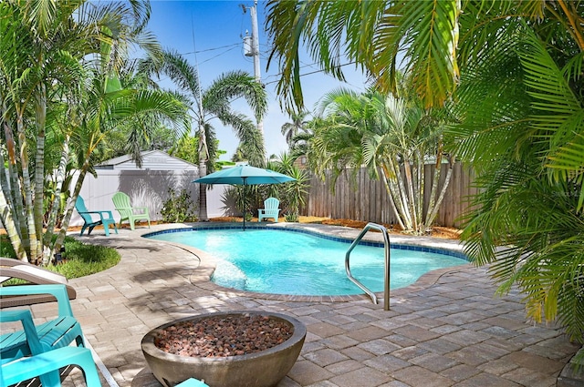 231 Ocean Blvd, Satellite Beach, FL 32937 - view of swimming pool with a fenced backyard and a patio