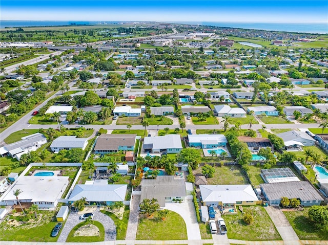 231 Ocean Blvd, Satellite Beach, FL 32937 - aerial view of property and surrounding area featuring nearby suburban area