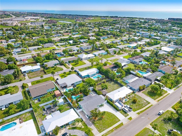 231 Ocean Blvd, Satellite Beach, FL 32937 - aerial view of property and surrounding area featuring nearby suburban area