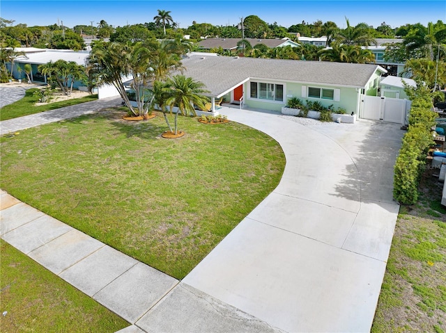 231 Ocean Blvd, Satellite Beach, FL 32937 - single story home with a gate and curved driveway