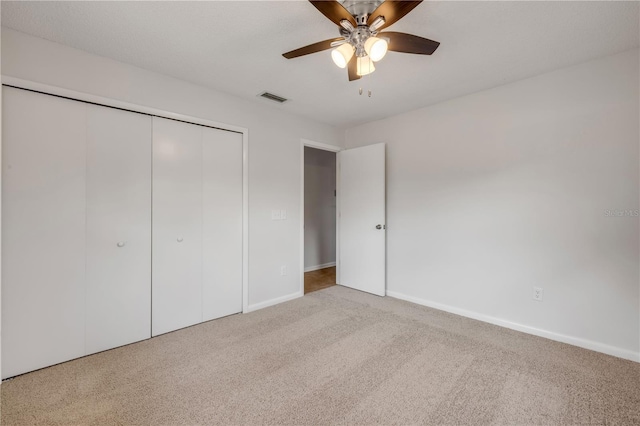 879 Tamerlane St, Deltona, FL 32725 - unfurnished bedroom featuring carpet floors, a closet, and ceiling fan