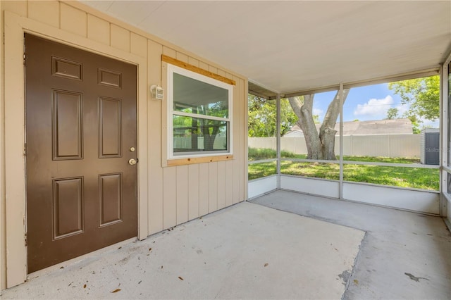 879 Tamerlane St, Deltona, FL 32725 - unfurnished sunroom with healthy amount of natural light