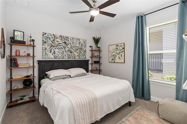 971 Braewood Dr, Clermont, FL 34715 - carpeted bedroom featuring baseboards and ceiling fan