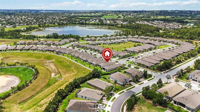 971 Braewood Dr, Clermont, FL 34715 - aerial view of property and surrounding area with nearby suburban area and a large body of water