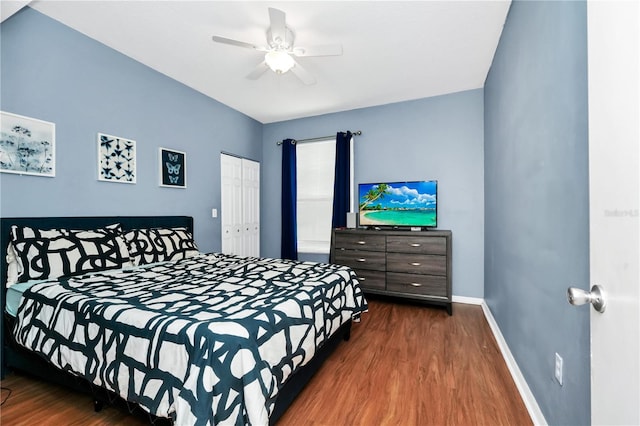 5566 Metrowest Blvd Unit 10, Orlando, FL 32811 - bedroom featuring wood finished floors, a closet, and a ceiling fan