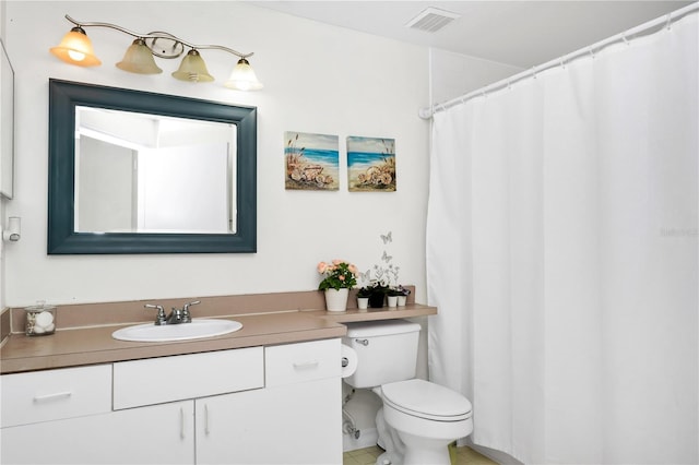 5566 Metrowest Blvd Unit 10, Orlando, FL 32811 - bathroom featuring vanity and curtained shower