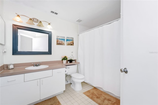 5566 Metrowest Blvd Unit 10, Orlando, FL 32811 - bathroom featuring vanity, tile patterned flooring, and curtained shower